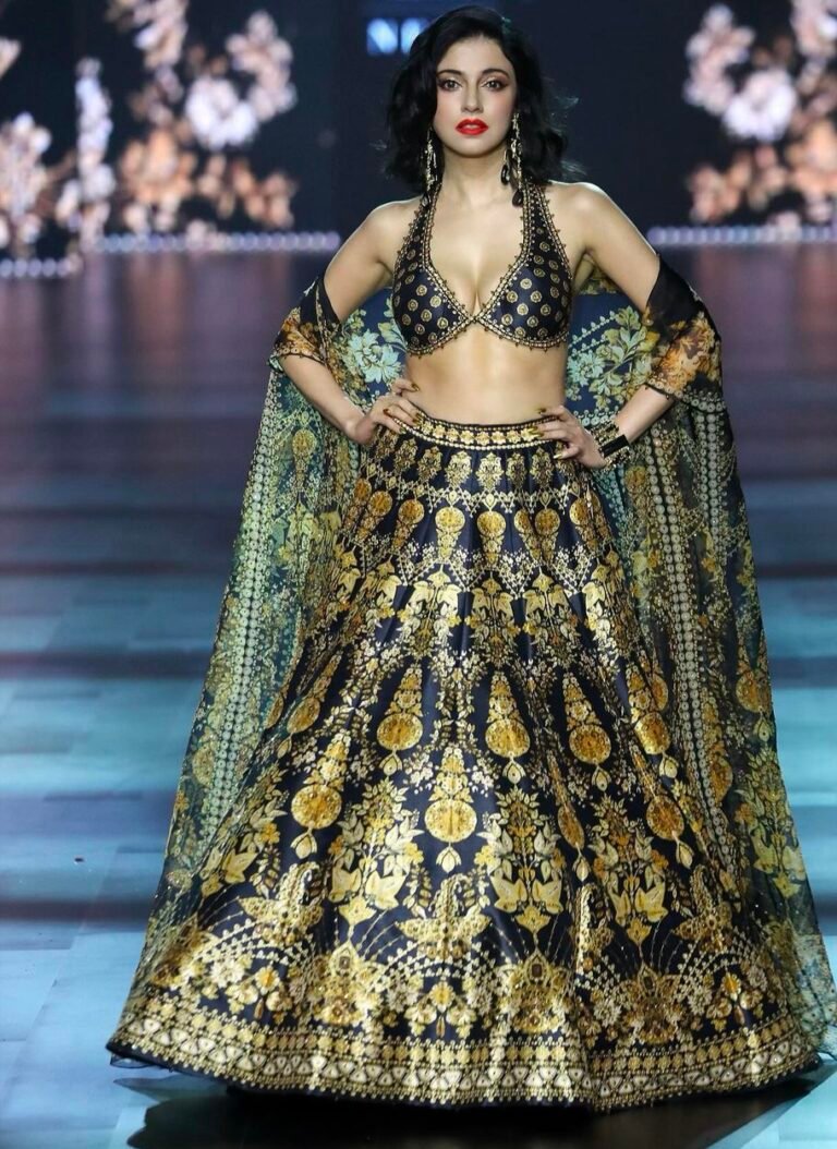 Actress and filmmaker Divya Khosla exuded regal elegance in a stunning ensemble by renowned designer Rajdeep Ranawat at LFW x FDCI on Day 3. Actress and filmmaker Divya Khosla exuded regal elegance in a stunning ensemble by renowned designer Rajdeep Ranawat at LFW x FDCI on Day 3.
