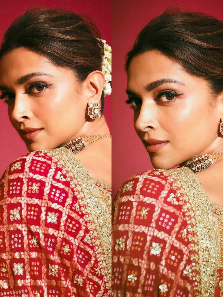 Deepika’s choice of a black blouse paired with a Sabyasachi saree is a perfect match.
